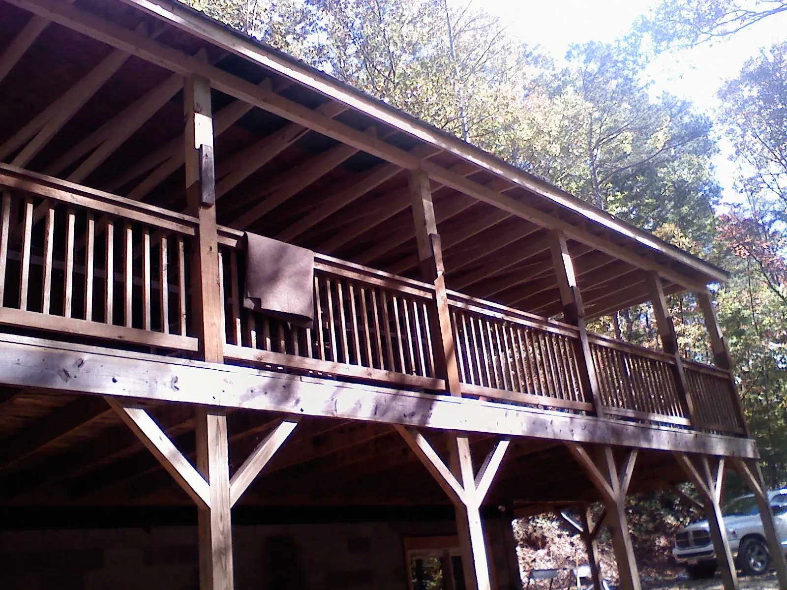 Timber framing under a new elevated porch and deck — Roof Leak Repair in Windsor Mill by Roofing Brothers